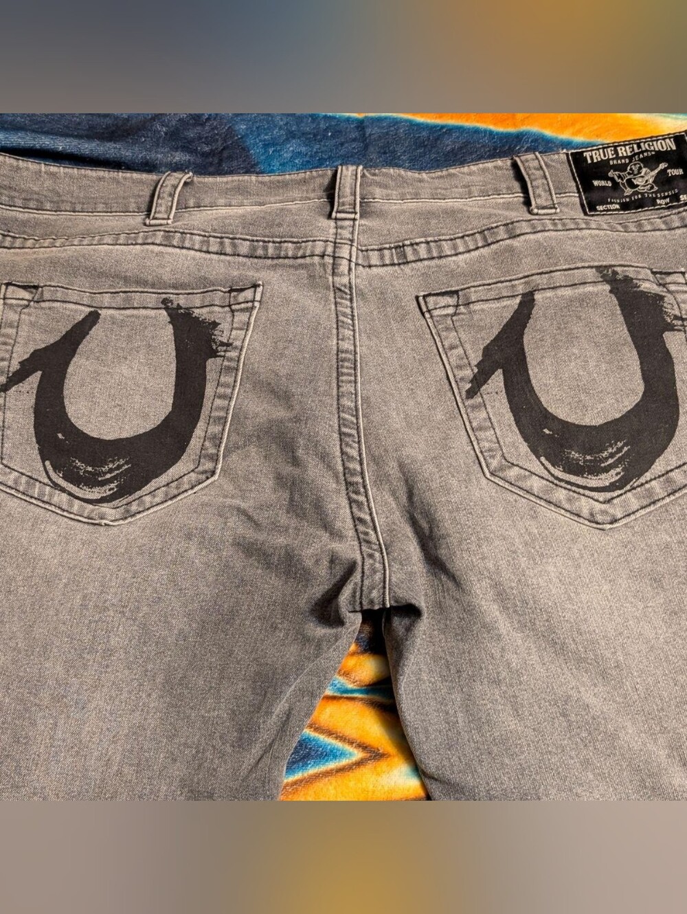 Men's True Religion Gray Rocco Jeans w Black Back Pocket Paint Stroke Horseshoes